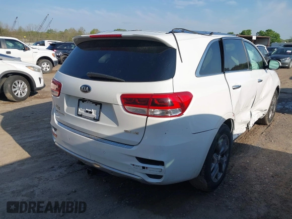 2016 Kia Sorento SX with VIN 5XYPKDA51GG072940, listed as a IAAI auction lot 42017504 with 110,897 mi miles. Bid and sale history available at carsss.com. Image 4.