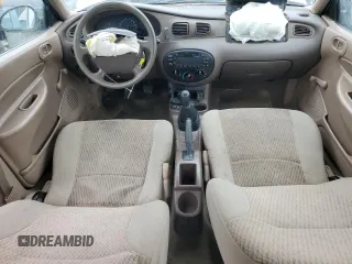 1999 Ford Escort LX with VIN 1FAFP10P6XW196483, listed as a Copart auction lot 59215635 with 74,859 mi miles and Salvage title. Bid and sale history available at DreamBid. Image 8.