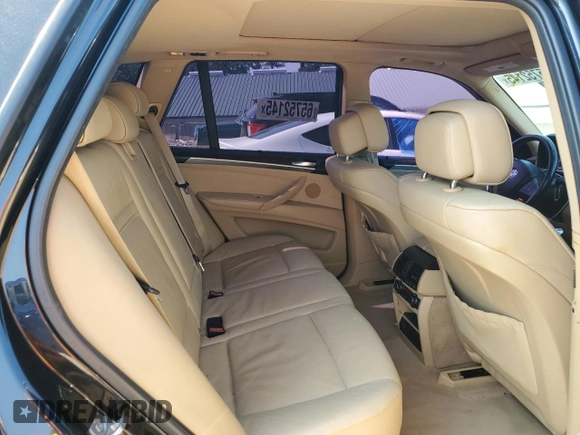 2012 BMW X5 35i with VIN 5UXZV4C57CL756062, listed as a Copart auction lot 65752145 with 160,860 mi miles and Clean title. Bid and sale history available at DreamBid. Image 11.