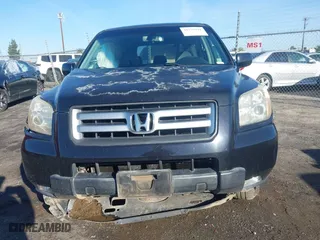 2006 Honda Pilot EX-L with VIN 5FNYF28586B037160, listed as a IAAI auction lot 41798991 with 207,486 mi miles. Bid and sale history available at carsss.com. Image 12.