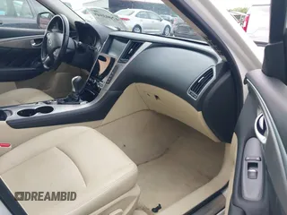 2014 Infiniti Q50 Premium with VIN JN1BV7AP3EM674807, listed as a IAAI auction lot 42003949 with 138,454 mi miles. Bid and sale history available at carsss.com. Image 5.