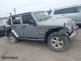2013 Jeep Wrangler Unlimited Sahara with VIN 1C4BJWEG4DL612947, listed as a IAAI auction lot 41644376 with 85,563 mi miles. Bid and sale history available at carsss.com. Image 13.