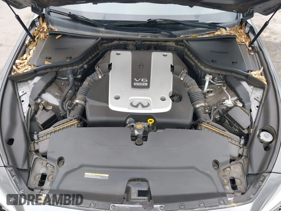 2015 Infiniti Q50 Premium z VIN JN1BV7AR7FM408015, wystawiony jako IAAI lot #42083301 z przebiegiem 58 817 mil mil oraz . Historia ofert i sprzedaży dostępna na DreamBid. Obrazek 10.