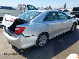 2013 Toyota Camry L with VIN 4T4BF1FKXDR313627, listed as a IAAI auction lot 41855022 with 128,782 mi miles. Bid and sale history available at carsss.com. Image 4.