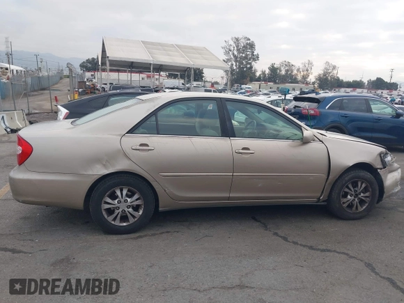 2004 Toyota Camry LE with VIN 4T1BF32K44U069081, listed as a IAAI auction lot 41460767 with 204,992 mi miles and . Bid and sale history available at carsss.com. Image 13.