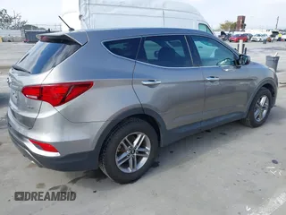 2018 Hyundai Santa Fe 2.4L with VIN 5NMZT3LB4JH069868, listed as a IAAI auction lot 42675555 with 142,612 mi miles and . Bid and sale history available at DreamBid. Image 4.