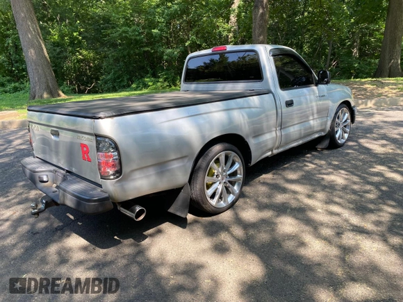 2003 Toyota Tacoma with VIN 5TENL42NX3Z150327, listed as a Copart auction lot 66626235 with 189,005 mi miles and Clean title. Bid and sale history available at DreamBid. Image 4.