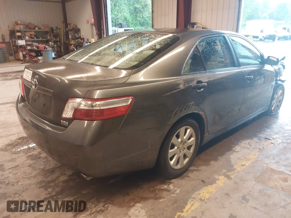 2007 Toyota Camry z VIN JTNBB46K573017707, wystawiony jako IAAI lot #42230423 z przebiegiem 140 843 mil mil oraz . Historia ofert i sprzedaży dostępna na DreamBid. Obrazek 4.