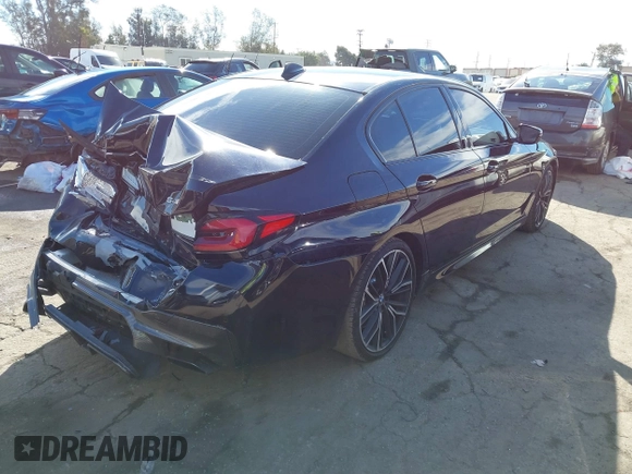 2023 BMW 5 Series 540i with VIN WBA53BJ06PWY11037, listed as a IAAI auction lot 41612304 with 37,274 mi miles and . Bid and sale history available at DreamBid. Image 4.