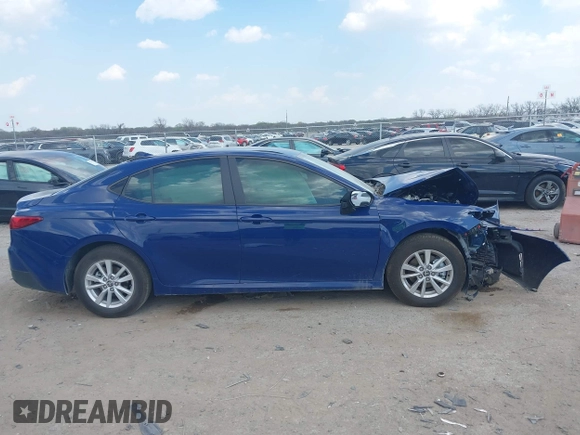 2025 Toyota Camry LE with VIN 4T1DAACK0SU091506, listed as a IAAI auction lot 41880460 with 8,407 mi miles and . Bid and sale history available at DreamBid. Image 13.