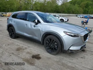 2023 Mazda CX-9 Touring Plus with VIN JM3TCBAY1P0659517, listed as a Copart auction lot 56396565 with 50,544 mi miles and Salvage title. Bid and sale history available at DreamBid. Image 4.