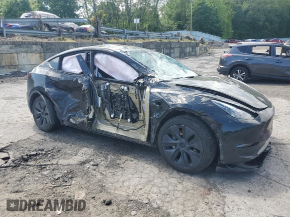 2024 Tesla Model Y Long Range with VIN 7SAYGDEE7RA327259, listed as a Copart auction lot 57494435 with Not provided miles and Salvage title. Bid and sale history available at DreamBid. Image 4.