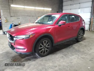 2018 Mazda CX-5 Touring z VIN JM3KFBCM9J0440261, wystawiony jako Copart lot #58850425 z przebiegiem 100 947 mil mil oraz Szkoda całkowita • Salvage title. Historia ofert i sprzedaży dostępna na DreamBid. Obrazek 1.