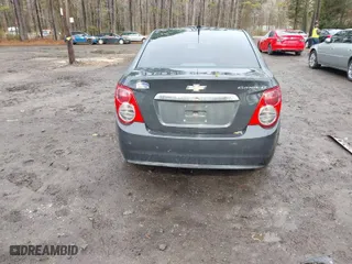 2014 Chevrolet Sonic LT with VIN 1G1JC5SH8E4234634, listed as a IAAI auction lot 41464054 with 117,113 mi miles. Bid and sale history available at carsss.com. Image 17.