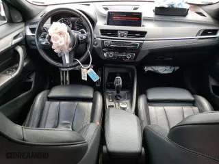 2021 BMW X2 xDrive28i with VIN WBXYJ1C04M5S67817, listed as a Copart auction lot 68214304 with 54,454 mi miles and Salvage Title. Bid and sale history available at carsss.com. Image 8.