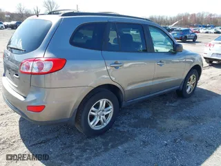 2012 Hyundai Santa Fe GLS with VIN 5XYZG3AB3CG101245, listed as a IAAI auction lot 41938369 with 191,385 mi miles. Bid and sale history available at carsss.com. Image 4.