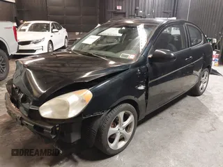 2007 Hyundai Accent SE with VIN KMHCN36C67U026540, listed as a IAAI auction lot 41062633 with 70,143 mi miles. Bid and sale history available at carsss.com. Image 19.