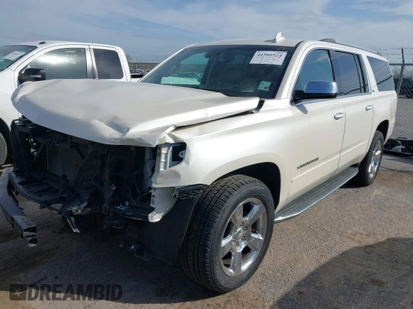 2015 Chevrolet Suburban LTZ with VIN 1GNSCKKC2FR741040, listed as a IAAI auction lot 41709574 with 87,795 mi miles and . Bid and sale history available at DreamBid. Image 2.