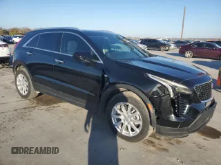 2023 Cadillac XT4 FWD Luxury z VIN 1GYAZAR42PF102696, wystawiony jako Copart lot #85540204 z przebiegiem 1 903 mil mil oraz Szkoda całkowita • Salvage title. Historia ofert i sprzedaży dostępna na DreamBid. Obrazek 4.