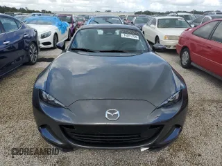 2024 Mazda MX-5 Miata Grand Touring z VIN JM1NDAM73R0603254, wystawiony jako Copart lot #74551704 z przebiegiem Nie podano mil oraz Nie do naprawy • Non repairable. Historia ofert i sprzedaży dostępna na DreamBid. Obrazek 5.