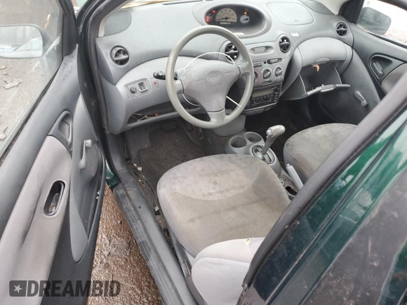 2000 Toyota ECHO with VIN JTDAT1231Y0041399, listed as a Copart auction lot 83774514 with 128,465 mi miles and Salvage Title. Bid and sale history available at DreamBid. Image 8.