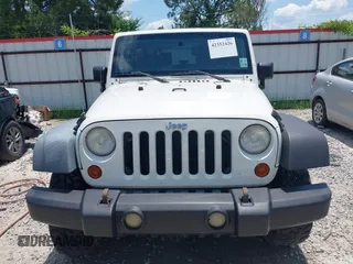 2009 Jeep Wrangler X with VIN 1J4FA24149L781794, listed as a IAAI auction lot 42352426 with 99,128 mi miles and . Bid and sale history available at DreamBid. Image 12.