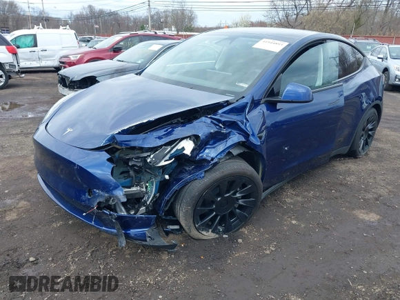 2023 Tesla Model Y Long Range with VIN 7SAYGDEE4PF891709, listed as a IAAI auction lot 41944893 with 15,864 mi miles. Bid and sale history available at carsss.com. Image 2.