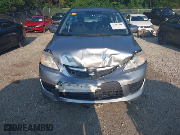 2010 Mazda 5 Sport with VIN JM1CR2W32A0385045, listed as a IAAI auction lot 42451448 with 127,762 mi miles and . Bid and sale history available at DreamBid. Image 6.