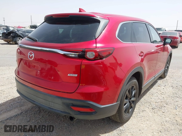 2016 Mazda CX-9 Touring z VIN JM3TCACY9G0102524, wystawiony jako IAAI lot #42305452 z przebiegiem 76 892 mil mil oraz . Historia ofert i sprzedaży dostępna na DreamBid. Obrazek 4.