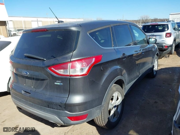 2015 Ford Escape SE with VIN 1FMCU9G99FUA81345, listed as a IAAI auction lot 41701043 with 203,300 mi miles. Bid and sale history available at carsss.com. Image 4.