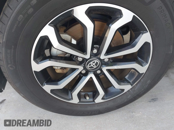 2023 Toyota Corolla Cross Hybrid S with VIN 7MUFBABG3PV001144, listed as a IAAI auction lot 42442124 with 116,674 mi miles and . Bid and sale history available at DreamBid. Image 6.