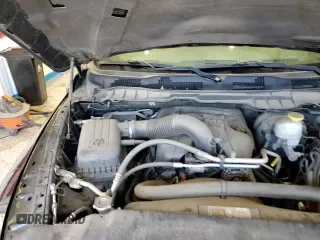 2018 Ram 1500 Big Horn z VIN 1C6RR7GTXJS244208, wystawiony jako Copart lot #62709965 z przebiegiem 107 897 mil mil oraz Szkoda całkowita • Salvage title. Historia ofert i sprzedaży dostępna na DreamBid. Obrazek 13.