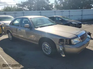 2003 Mercury Grand Marquis GS Convenience with VIN 2MEFM74WX3X707679, listed as a Copart auction lot 73963754 with 75,143 mi miles and Salvage Title. Bid and sale history available at carsss.com. Image 4.
