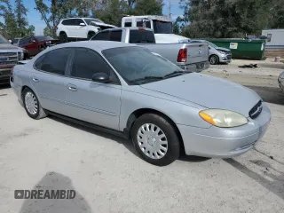 2003 Ford Taurus LX Standard z VIN 1FAFP52U43A110444, wystawiony jako Copart lot #83557764 z przebiegiem 118 897 mil mil oraz Szkoda całkowita • Salvage title. Historia ofert i sprzedaży dostępna na DreamBid. Obrazek 4.