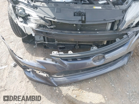 2015 Scion tC z VIN JTKJF5C70FJ013710, wystawiony jako IAAI lot #41770647 z przebiegiem Nie podano mil oraz . Historia ofert i sprzedaży dostępna na DreamBid. Obrazek 6.