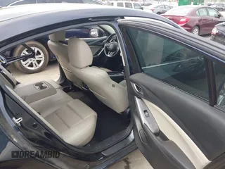 2016 Mazda Mazda6 i Touring with VIN JM1GJ1V59G1402867, listed as a IAAI auction lot 41998212 with 135,724 mi miles. Bid and sale history available at carsss.com. Image 8.