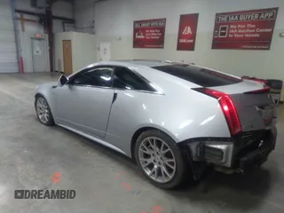2012 Cadillac CTS Performance with VIN 1G6DJ1E31C0110232, listed as a IAAI auction lot 41185119 with 140,298 mi miles and . Bid and sale history available at DreamBid. Image 3.