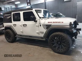 2019 Jeep Wrangler Unlimited Sport S z VIN 1C4HJXDG4KW639403, wystawiony jako IAAI lot #42158096 z przebiegiem 132 569 mil mil oraz . Historia ofert i sprzedaży dostępna na DreamBid. Obrazek 14.