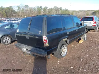 1997 Chevrolet Tahoe with VIN 1GNEK13R9VJ428657, listed as a IAAI auction lot 41324736 with 250,008 mi miles. Bid and sale history available at carsss.com. Image 4.