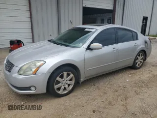 2004 Nissan Maxima SL with VIN 1N4BA41EX4C869772, listed as a Copart auction lot 69843554 with 205,409 mi miles and Salvage Title. Bid and sale history available at carsss.com. Image 1.