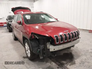 2015 Jeep Cherokee Latitude with VIN 1C4PJLCB6FW616477, listed as a IAAI auction lot 41812431 with 131,234 mi miles. Bid and sale history available at carsss.com. Image 6.