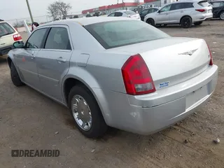 2005 Chrysler 300 with VIN 2C3JA53G85H159623, listed as a IAAI auction lot 41773424 with 127,764 mi miles. Bid and sale history available at carsss.com. Image 3.