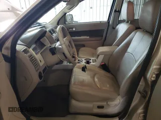 2011 Mercury Mariner Premier z VIN 4M2CN9HG9BKJ06775, wystawiony jako Copart lot #59256315 z przebiegiem 186 694 mil mil oraz Szkoda całkowita • Salvage title. Historia ofert i sprzedaży dostępna na DreamBid. Obrazek 7.