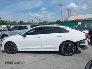 2022 Kia K5 GT-Line z VIN 5XXG64J24NG114772, wystawiony jako IAAI lot #42161747 z przebiegiem 60 761 mil mil oraz . Historia ofert i sprzedaży dostępna na DreamBid. Obrazek 15.