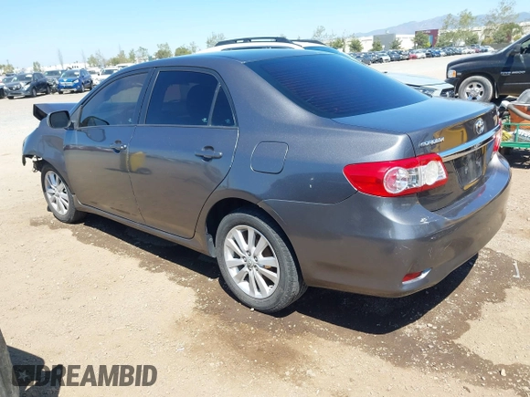 2011 Toyota Corolla L with VIN 2T1BU4EE7BC738640, listed as a IAAI auction lot 42024474 with 164,322 mi miles. Bid and sale history available at carsss.com. Image 3.
