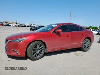 2016 Mazda 6 i Grand Touring с VIN JM1GJ1W55G1486734, выставлен на аукционе Copart как лот 52588495 с пробегом 195 356 миль миль и Списание • Salvage title. История ставок и продаж доступна на DreamBid. Изображение 1.