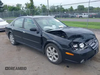 2002 Nissan Maxima GXE with VIN JN1DA31D52T429057, listed as a IAAI auction lot 42771435 with 122,398 mi miles and . Bid and sale history available at DreamBid. Image 1.