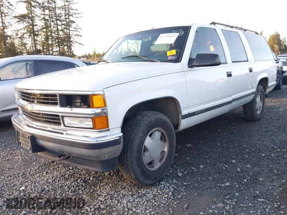 1997 Chevrolet Suburban with VIN 3GNFK16RXVG102805, listed as a IAAI auction lot 41559415 with 1 mi miles. Bid and sale history available at carsss.com. Image 16.