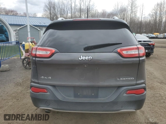 2014 Jeep Cherokee Limited with VIN 1C4PJMDB7EW138895, listed as a Copart auction lot 52585115 with 199,744 mi miles and Salvage Title. Bid and sale history available at DreamBid. Image 6.