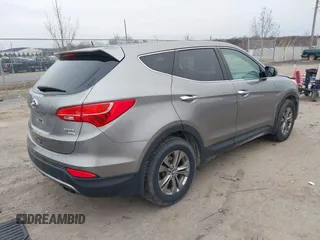 2014 Hyundai Santa Fe z VIN 5XYZTDLB5EG166650, wystawiony jako IAAI lot #41520847 z przebiegiem 197 250 mil mil oraz . Historia ofert i sprzedaży dostępna na DreamBid. Obrazek 4.